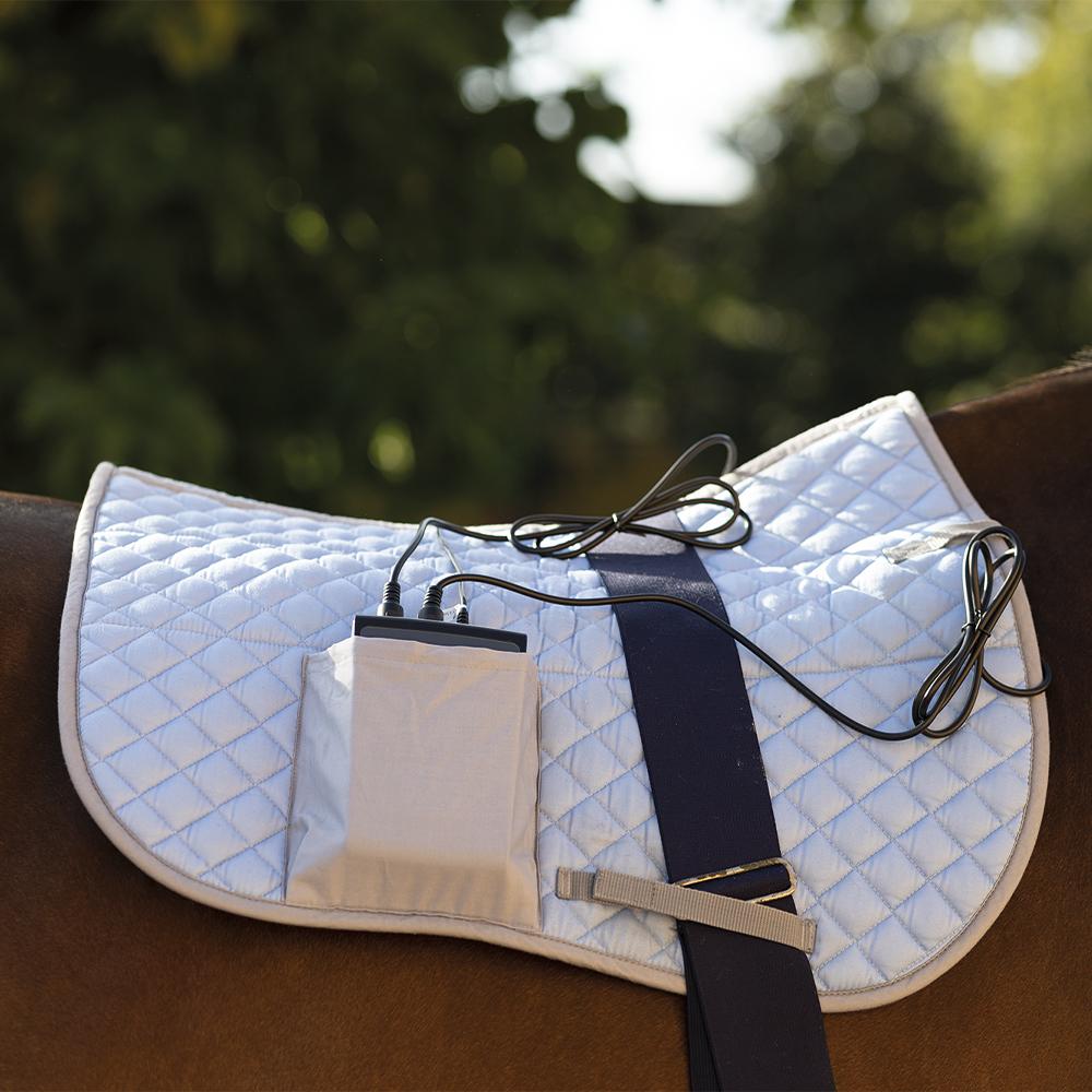 a saddle with a battery attached to it